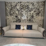 Cream Diamond-Tufted Leather Sofa with Scroll Armrests and Dark High-Gloss Wood Sides